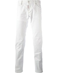 Белые зауженные джинсы