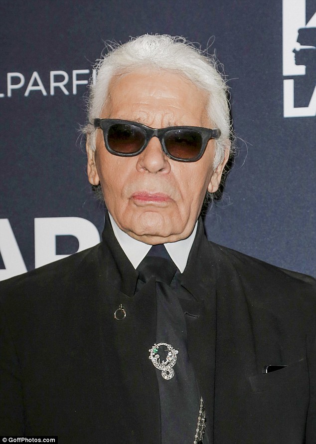 The man himself: Designer Karl Lagerfeld stuck to his trademark monochrome look at his party