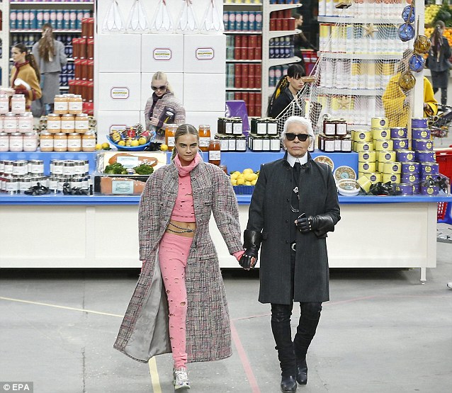 Sharp tongued: Despite Miss Delevingne being a firm favorite of Mr Lagerfeld (pictured together closing Chanel