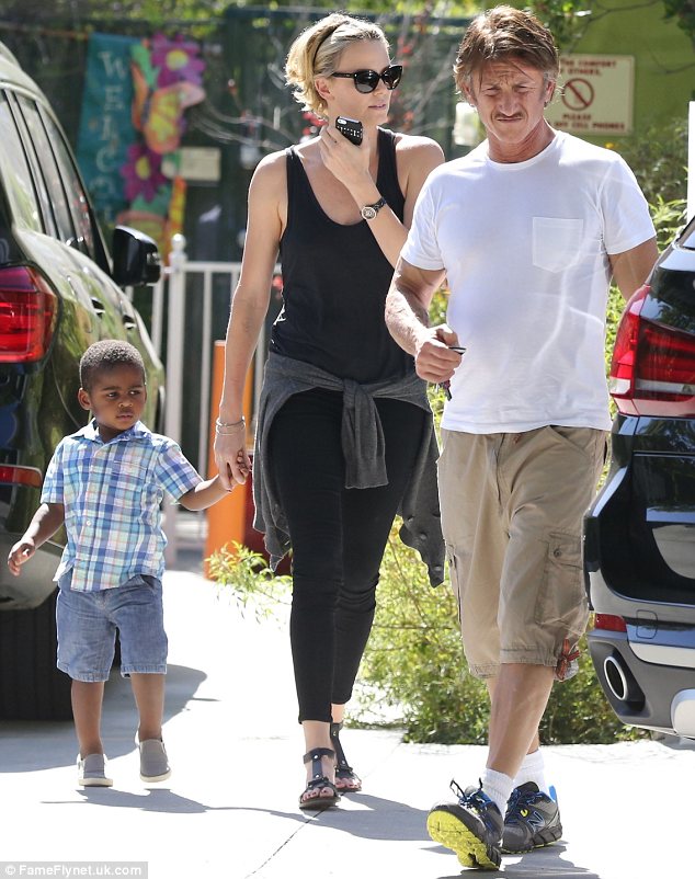 Family outing: Charlize had spent the day at the park with her son Jackson and boyfriend Sean Penn