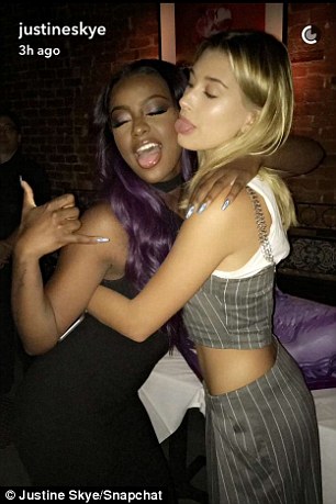 Tongues out! She posted a series of cheeky snaps with her friends